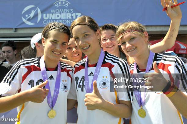 Dzsenifer Marozsan, Ivana Rudelic and Alexandra Popp, the three scorers of Germany celebrate with their medals after the UEFA Women's U17 European...