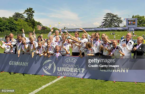 Team Germany celebrates after winning the UEFA Women's U17 European championship match between Germany and France at the Colovray stadium on May 23,...