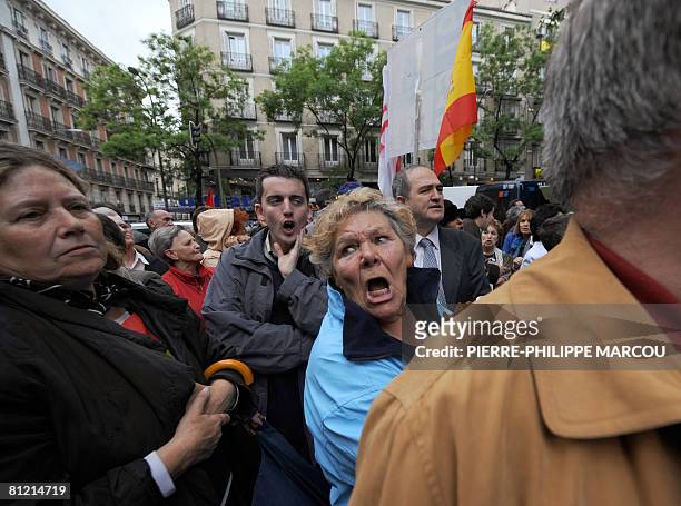 Woman supporting Basque Popular Party leader Maria San Gil shouts in front of the Popular Party's Madrid headquarters on May 23, 2008. San Gil told...