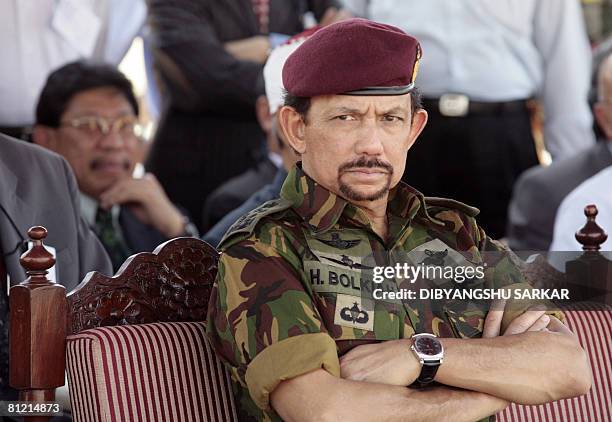 Sultan Hazi Hassanal Bolkiah of Brunei Darussalam looks on during his visit to the Parachute Regiment Training Centre of the Indian Army in Bangalore...