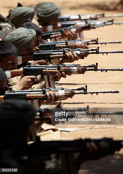 Newly recruited Indian army officers participate in a training session of the Parachute Regiment at a training centre of the Indian Army in Bangalore...