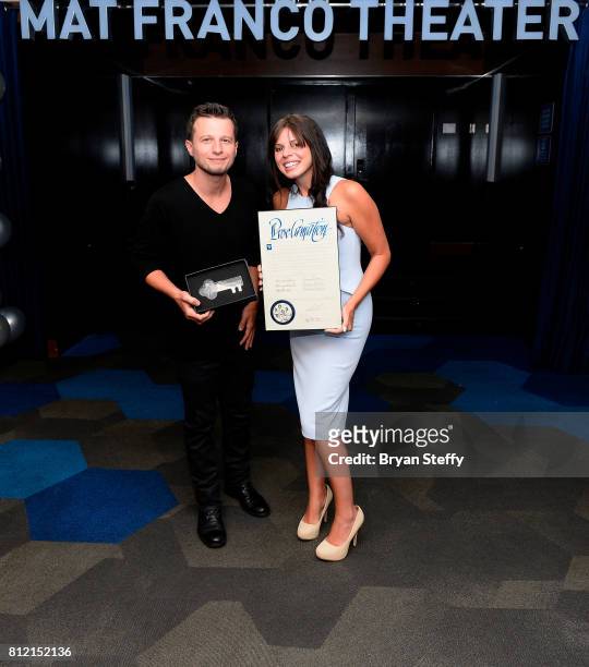 Magician Mat Franco and Tianna Scartabello hold a ceremonial key to the Las Vegas Strip and a proclamation presented to him as part of the ceremony...