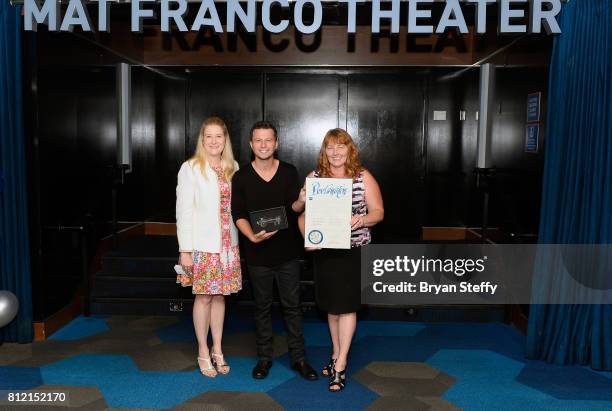 Regional President of the Linq Hotel & Casino Eileen Moore, magician Mat Franco and Clark County Commissioner Marilyn Kirkpatrick hold a ceremonial...