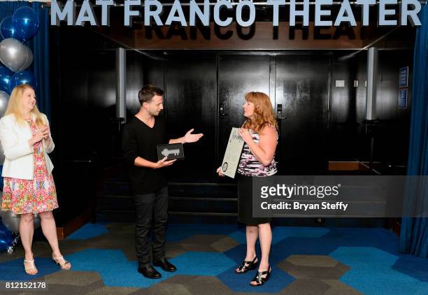 Regional President of the Linq Hotel & Casino Eileen Moore watches as magician Mat Franco is presented with a ceremonial key to the Las Vegas Strip...