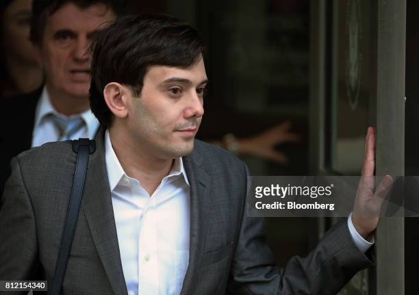 Martin Shkreli, former chief executive officer of Turing Pharmaceuticals AG, leaves a federal court in the Brooklyn borough of New York, U.S., on...