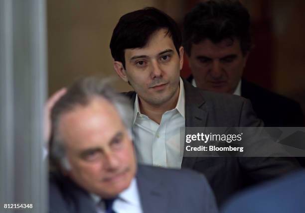 Martin Shkreli, former chief executive officer of Turing Pharmaceuticals AG, center, leaves a federal court in the Brooklyn borough of New York,...