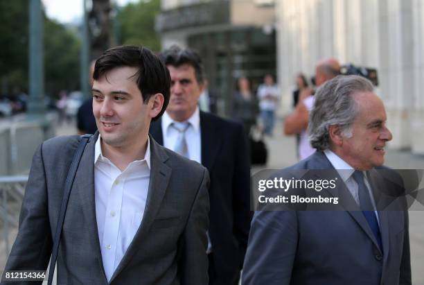 Martin Shkreli, former chief executive officer of Turing Pharmaceuticals AG, left, leaves federal court with his attorney Benjamin Brafman in the...