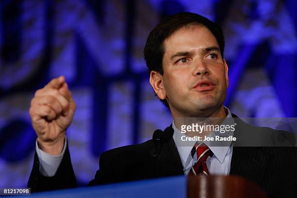 Florida's Speaker of the House Marco Rubio delivers a speech about Cuba before Democratic presidential hopeful Sen. Barack Obama speaks during a...