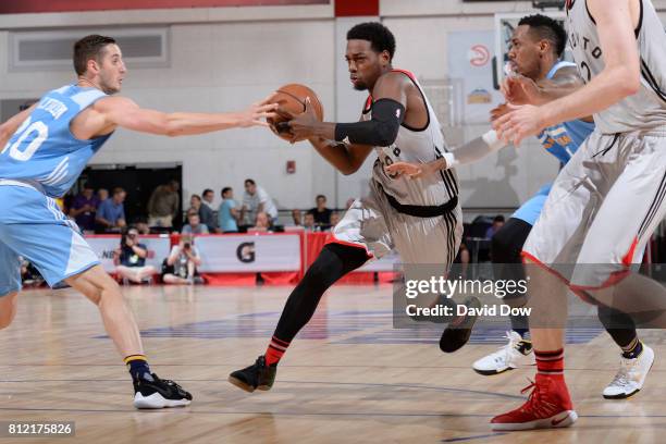 Jordan Loyd of the Toronto Raptors handles the ball against the Denver Nuggets during the 2017 Las Vegas Summer League on July 10, 2017 at the Cox...