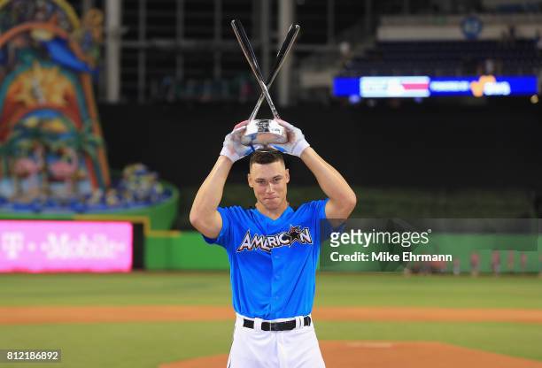 Aaron Judge of the New York Yankees celebrates with the trophy after winning the T-Mobile Home Run Derby at Marlins Park on July 10, 2017 in Miami,...