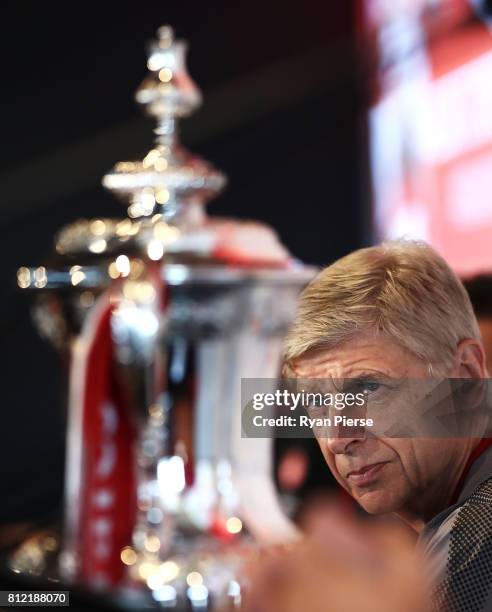 Arsenal Manger Arsene Wenger looks at the FA Cup during an Official Welcome to Sydney for Arsenal FC at Museum of Contemporary Art on July 11, 2017...