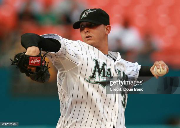 Starting pitcher Scott Olsen of the Florida Marlins pitches against the San Francisco Giants at Dolphin Stadium on May 23, 2008 in Miami, Florida.