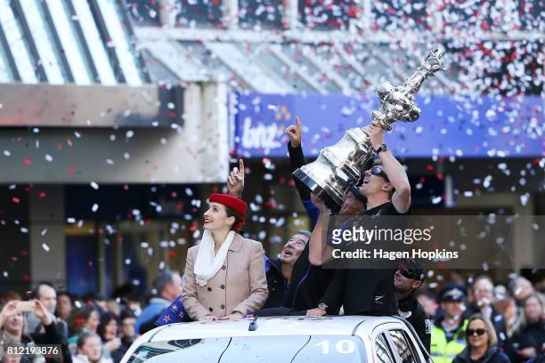 Helmsman, Peter Burling, holds the Americas Cup during the Team New Zealand Americas Cup Wellington Welcome Home Parade on July 11, 2017 in...