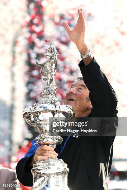 Bob Field holds the Americas Cup during the Team New Zealand Americas Cup Wellington Welcome Home Parade on July 11, 2017 in Wellington, New Zealand.