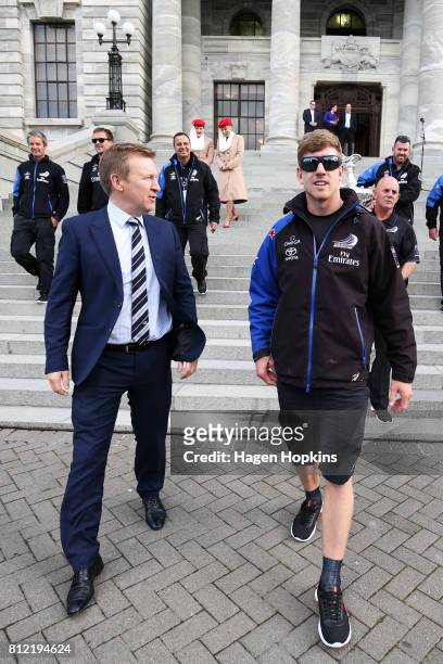 Helmsman, Peter Burling, speaks to Minister for Sport and Recreation, Jonathan Coleman, during the Team New Zealand Americas Cup Wellington Welcome...
