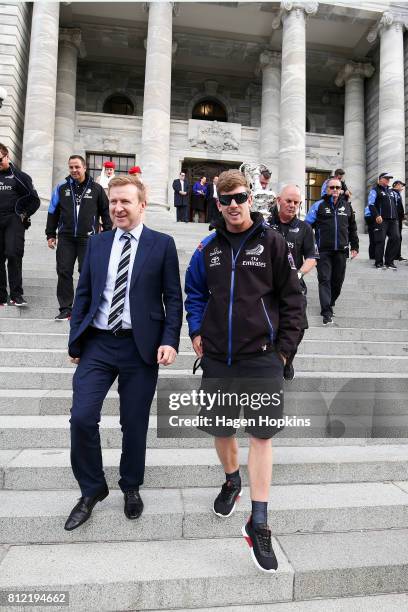 Helmsman, Peter Burling, speaks to Minister for Sport and Recreation, Jonathan Coleman, during the Team New Zealand Americas Cup Wellington Welcome...