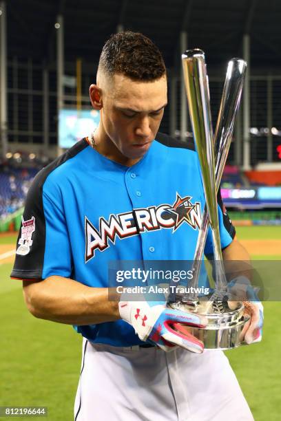 Aaron Judge of the New York Yankees poses with the Home Run Derby trophy after winning the 2017 T-Mobile Home Run Derby at Marlins Park on Monday,...