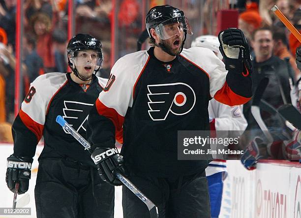Vaclav Prospal and Daniel Briere of the Philadelphia Flyers celebrate a goal against the Montreal Canadiens during Game 4 of the Eastern Conference...