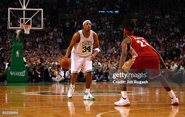 Paul Pierce of the Boston Celtics looks to move the ball against LeBron James of the Cleveland Cavaliers in Game Seven of the Eastern Conference...