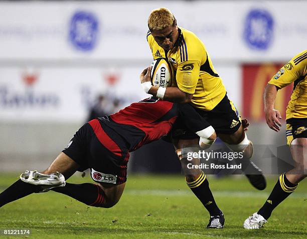 Jerry Collins of the Hurricanes runs at the Crusaders defence during the Super 14 semi-final match between the Crusaders and the Hurricanes at AMI...