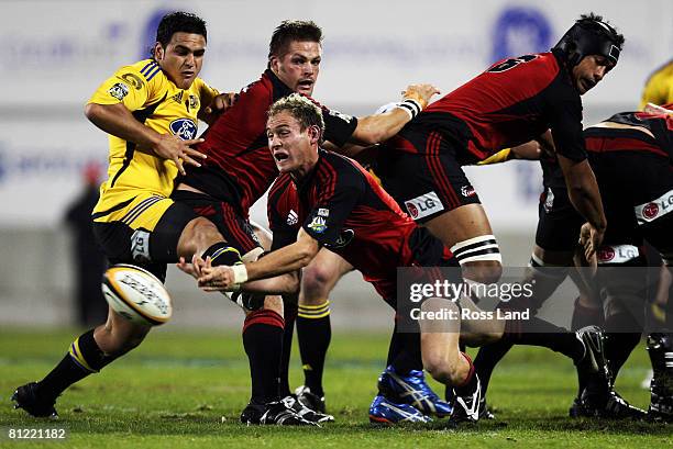 Andy Ellis the Crusaders passes the ball from the back of a ruck during the Super 14 semi-final match between the Crusaders and the Hurricanes at AMI...