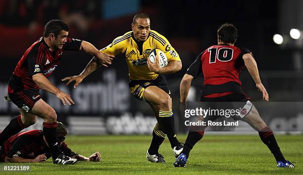 Hosea Gear of the Hurricanes runs at the Crusaders defence during the Super 14 semi-final match between the Crusaders and the Hurricanes at AMI...