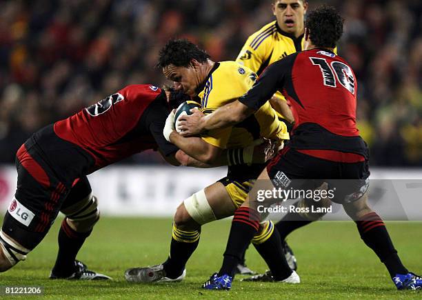 Chris Masoe of the Hurricanes is tackled during the Super 14 semi-final match between the Crusaders and the Hurricanes at AMI Stadium on May 24, 2008...
