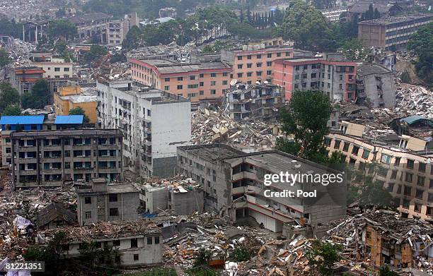 An aerial view shows the earthquake-hit Yingxiu town during U.N. Secretary-General Ban Ki-moon's visit to the area May 24, 2008 Wenchuan county,...