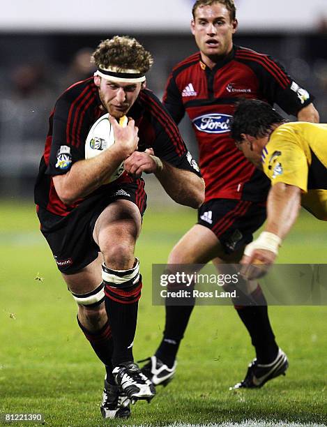 Kieran Read of the Crusaders takes on the Hurricanes defence during the Super 14 semi-final match between the Crusaders and the Hurricanes at AMI...