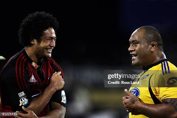 Mose Tuiali'i of the Crusader and Neemia Tialata of the Hurricanes share a joke following the Super 14 semi-final match between the Crusaders and the...