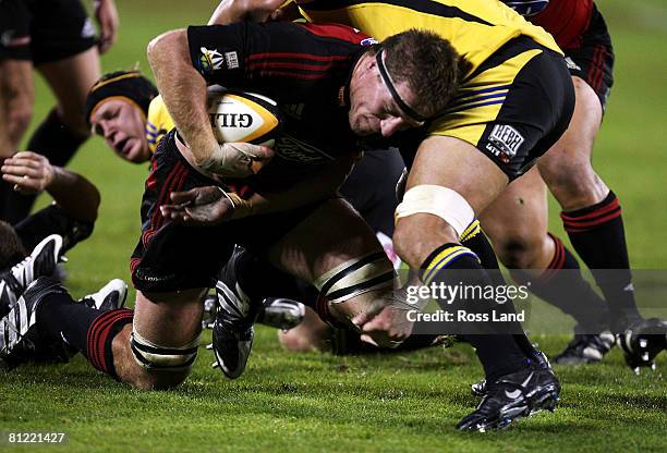 Brad Thorn of the Crusaders is tackled during the Super 14 semi-final match between the Crusaders and the Hurricanes at AMI Stadium on May 24, 2008...