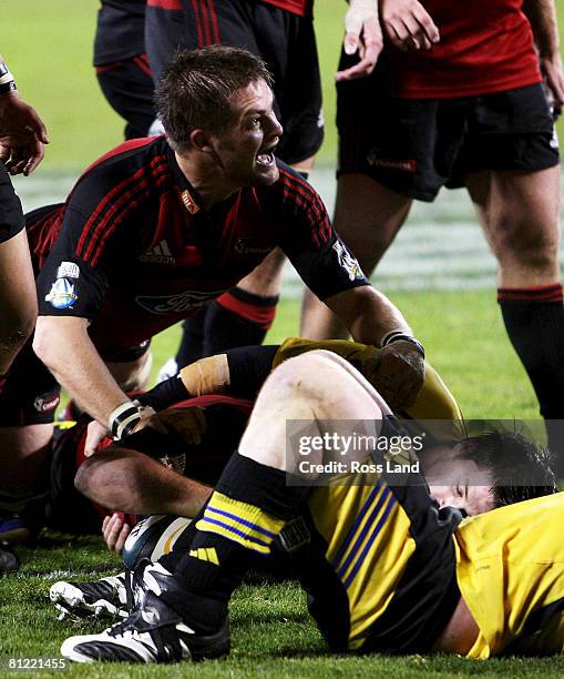 Richie McCaw of the Crusaders celebrates a Keiran Read try during the Super 14 semi-final match between the Crusaders and the Hurricanes at AMI...