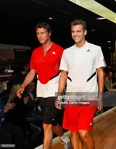 Marat Safin and Paul-Henri Mathieu wear adidas Tennis at the adidas and French Tennis Federation parntership extension. Adidas Concept Store, on May...