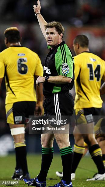 Referee Stuart Dickinson of Australia signals a penalty during the Super 14 semi-final match between the Crusaders and the Hurricanes at AMI Stadium...