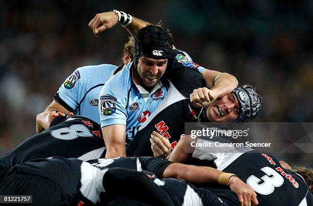 Dan Vickerman of the Waratahs controls a maul over Steven Sykes of the Sharks during the Super 14 semi-final match between the Waratahs and the...