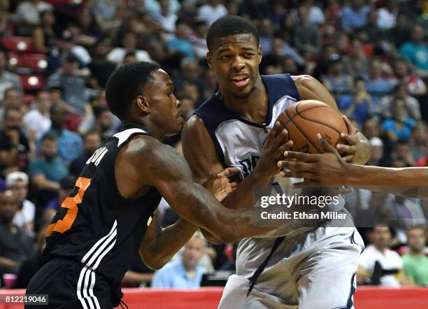 Joe Jackson of the Phoenix Suns guards Dennis Smith Jr. #1 of the Dallas Mavericks during the 2017 Summer League at the Thomas & Mack Center on July...