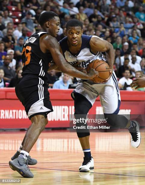 Joe Jackson of the Phoenix Suns guards Dennis Smith Jr. #1 of the Dallas Mavericks during the 2017 Summer League at the Thomas & Mack Center on July...