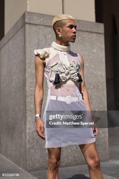 Maitao is seen attending New York Men's Day at Dune Studios during Men's New York Fashion Week wearing a white avant garde outfit on July 10, 2017 in...
