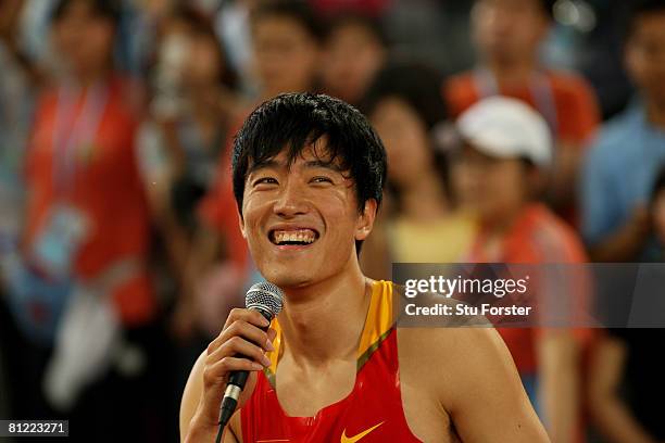 Xiang Liu of China speaks to the crowd after winning the Men's 110 Metres Hurdles during day three of the Good Luck Beijing 2008 China Athletics Open...