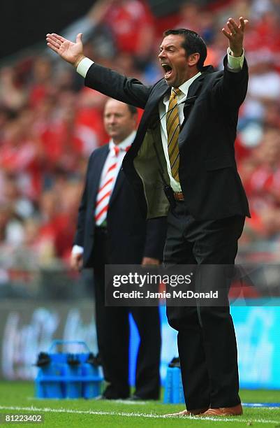 Phil Brown manager of Hull City appeals as Gary Johnson manager of Bristol City looks on during the Coca Cola Championship Playoff Final match...