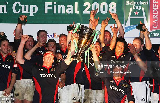Paul O'Connell of Munster and Ronan O'Gara of Munster lift the trophy after the Heineken Cup Final between Munster and Toulouse at the Millennium...