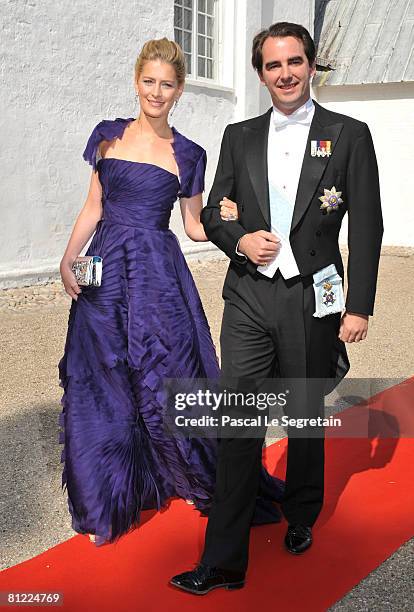 Greek Crown Prince Pavlos and wife Marie-Chantal arrive to attend the wedding between Prince Joachim of Denmark and Marie Cavallier on May 24, 2008...