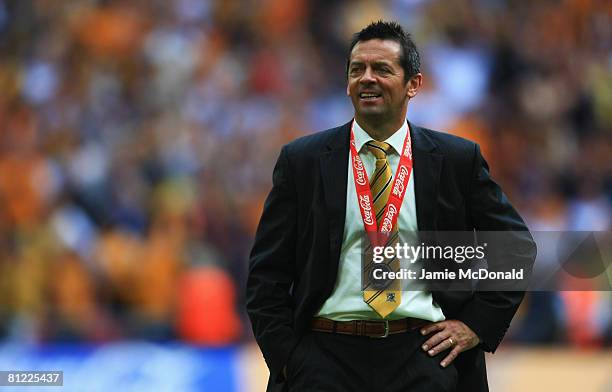 Hull City manager Phil Brown looks on after victory following the Coca Cola Championship Playoff Final match between Hull City and Bristol City at...