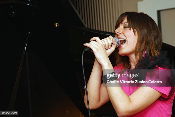 Meg Playing Instruments Meg (Singer) Photos and Premium High Res Pictures - Getty Images