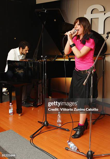 Meg Playing Instruments Meg (Singer) Photos and Premium High Res Pictures - Getty Images