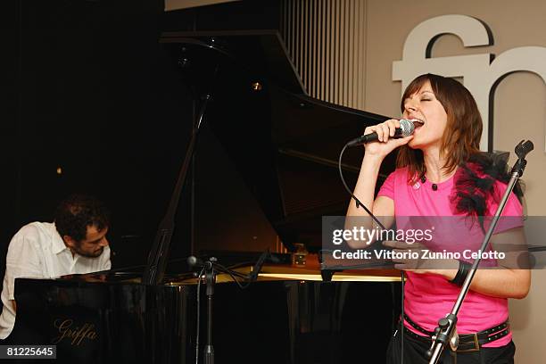 Meg Playing Instruments Meg (Singer) Photos and Premium High Res Pictures - Getty Images