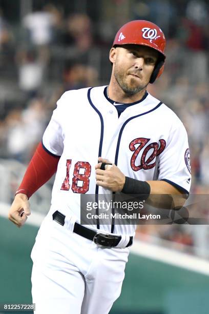 Ryan Raburn of the Washington Nationals rounds the bases after hitting a home run during a baseball game against the New York Mets at Nationals Park...