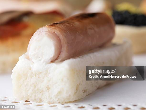 close up of a ham and cheese appetizer.  - angel herrero de frutos stock-fotos und bilder