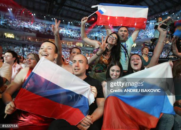 Russian music fans celebrate Dima Bilan's winning of the Eurovision Song Contest 2008 at Belgrade Arena early on May 25, 2008. Bilan won the 53rd...