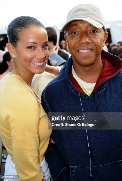 Hip-hop mogul Russell Simmons and model Porschla Coleman attend the Annual Hamptons Magazine Memorial Day Celebration with Cover Star Kim Cattrall on...